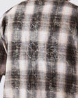 Chemise homme à motif carreaux avec broderie au dos