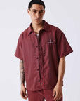 Chemise à motif rayé avec broderie au dos