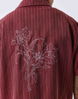 Chemise à motif rayé avec broderie au dos