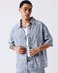 Chemise manches courtes en denim effet usé