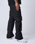 Jeans évasé à détails effilochés