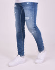 Jean skinny effet usé