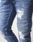 Jean slim basic bleu avec trous