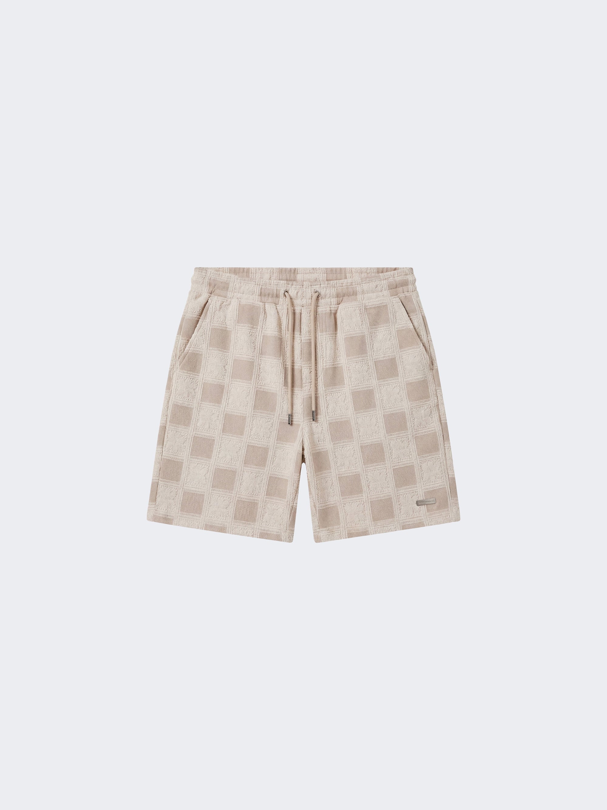 Short homme texturé à motif carreaux