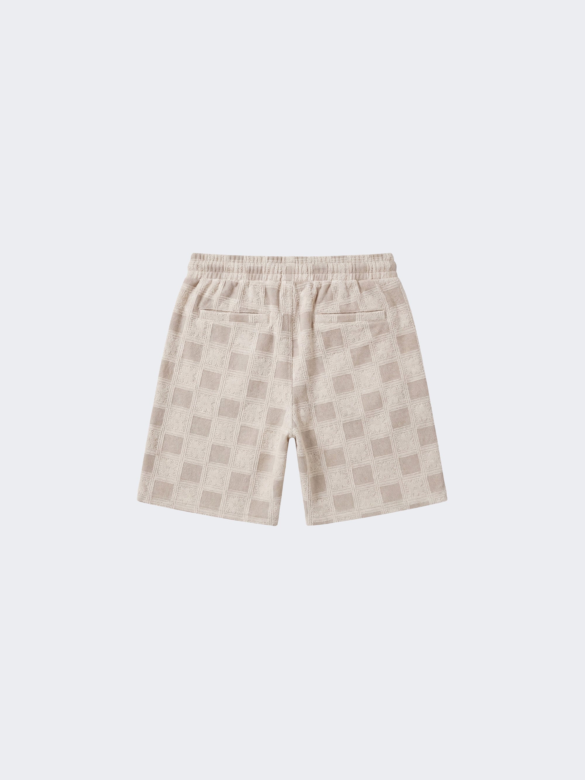 Short homme texturé à motif carreaux