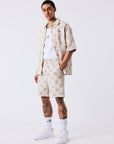Short homme texturé à motif carreaux