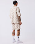 Short homme texturé à motif carreaux