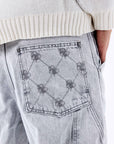 Jeans ample à détails charpentier