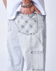 Jeans ample à détails charpentier