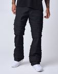 Jeans évasé à détails effilochés