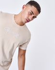 T-shirt logo brodé en relief