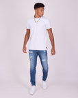 Jean skinny effet usé