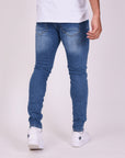 Jean skinny effet usé